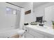 Simple bathroom with shower/tub combo and white vanity at 8044 Edward Baher Ave, Las Vegas, NV 89149