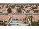 Aerial view showing home, pool, and surrounding neighborhood at 8212 Bolingbrook Ave, Las Vegas, NV 89149