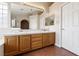 Double vanity bathroom with large mirror and tile flooring at 8212 Bolingbrook Ave, Las Vegas, NV 89149