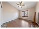 Bright bedroom with tile floors and a full-wall mirror at 8212 Bolingbrook Ave, Las Vegas, NV 89149