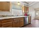 Kitchen sink and dishwasher with granite countertop at 8212 Bolingbrook Ave, Las Vegas, NV 89149