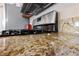 Kitchen counter with granite countertop and gas stove at 8212 Bolingbrook Ave, Las Vegas, NV 89149