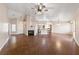 Bright living room with tile floors, fireplace, and access to kitchen at 8212 Bolingbrook Ave, Las Vegas, NV 89149