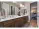 Double vanity bathroom with modern finishes and ample counter space at 8750 Lutts St, Las Vegas, NV 89131