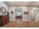 Bright entryway with hardwood floors and a view into the dining room at 8750 Lutts St, Las Vegas, NV 89131