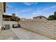 Private backyard patio with block wall and space for seating at 9330 Golden Timber Ln, Las Vegas, NV 89117