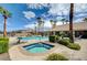 Inviting community pool and spa area with ample lounge chairs at 9330 Golden Timber Ln, Las Vegas, NV 89117