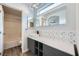 Modern bathroom with gray vanity and updated fixtures at 947 Cantabria Heights Ave, Las Vegas, NV 89183