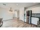 Modern kitchen with stainless steel appliances and light wood flooring at 947 Cantabria Heights Ave, Las Vegas, NV 89183