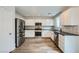 Modern kitchen with stainless steel appliances and granite countertops at 947 Cantabria Heights Ave, Las Vegas, NV 89183