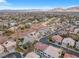 A lovely neighborhood with mature trees and a golf course in the distance at 99 Teton Pines Dr, Henderson, NV 89074