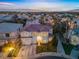 Charming two-story home with a well-manicured lawn and a tile roof in a desirable neighborhood at 99 Teton Pines Dr, Henderson, NV 89074