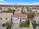 Charming two-story home with a well-manicured lawn and a tile roof in a desirable neighborhood at 99 Teton Pines Dr, Henderson, NV 89074