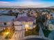 Charming two-story home with a well-manicured lawn and a tile roof in a desirable neighborhood at 99 Teton Pines Dr, Henderson, NV 89074