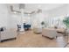 Bright living room with natural light and cozy furniture, creating a welcoming and relaxing atmosphere at 99 Teton Pines Dr, Henderson, NV 89074