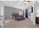 Serene main bedroom featuring soft carpeting, a large bed, and window accents at 99 Teton Pines Dr, Henderson, NV 89074