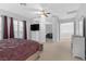 Spacious main bedroom with a ceiling fan, natural light, and neutral décor at 99 Teton Pines Dr, Henderson, NV 89074