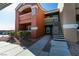 Two story building exterior with stairs, landscaping, and parking at , Las Vegas, NV 89147