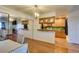 Well-equipped kitchen with wood cabinets and green tile backsplash at , Las Vegas, NV 89147