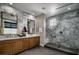 Elegant bathroom with marble walls and walk-in shower at 10119 Sequoia Glen Ave, Las Vegas, NV 89166