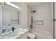 Modern bathroom with marble vanity and walk-in shower at 10282 Country Flats Ln, Las Vegas, NV 89135