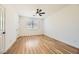 Bright bedroom with hardwood floors and ceiling fan at 10282 Country Flats Ln, Las Vegas, NV 89135