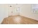 Bright and airy entryway with light hardwood floors at 10282 Country Flats Ln, Las Vegas, NV 89135