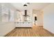 Modern kitchen with white cabinets and marble countertops at 10282 Country Flats Ln, Las Vegas, NV 89135