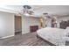 Main bedroom featuring wood floors and dual ceiling fans at 108 S Mallard St, Las Vegas, NV 89107