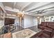 Living area with hardwood floors, fireplace, and ceiling fan at 108 S Mallard St, Las Vegas, NV 89107