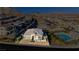 Aerial view of a house in a community with a pool at 11700 Belorado Ave, Las Vegas, NV 89138