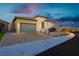 Modern home with attached garage and attractive landscaping at 11700 Belorado Ave, Las Vegas, NV 89138