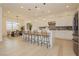 Modern kitchen with island and breakfast bar seating at 11700 Belorado Ave, Las Vegas, NV 89138