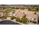 Aerial view of a neighborhood with houses and a golf course at 1172 Via Della Costrella, Henderson, NV 89011