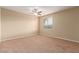 Bedroom with neutral carpet, paint and window with blinds at 1172 Via Della Costrella, Henderson, NV 89011