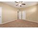 Bedroom features carpet, neutral paint and a closet with double doors at 1172 Via Della Costrella, Henderson, NV 89011