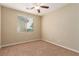 Well-lit bedroom with ceiling fan and window coverings at 1172 Via Della Costrella, Henderson, NV 89011