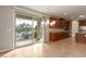 Open dining area adjacent to the kitchen featuring sliding door access to the backyard at 1172 Via Della Costrella, Henderson, NV 89011