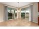 Bright dining room with two sliding doors and views to the outside at 1172 Via Della Costrella, Henderson, NV 89011