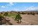 Expansive view of a golf course, mountains, and residential area at 1172 Via Della Costrella, Henderson, NV 89011