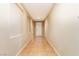 Long hallway with tile flooring and a neutral color palette at 1172 Via Della Costrella, Henderson, NV 89011