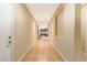 Long hallway with tile flooring leads to the kitchen at 1172 Via Della Costrella, Henderson, NV 89011