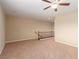 Bright loft bedroom with neutral carpeting and ceiling fan at 1172 Via Della Costrella, Henderson, NV 89011