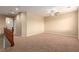 Spacious loft area with neutral carpeting and ceiling fan at 1172 Via Della Costrella, Henderson, NV 89011