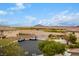 A residential street with mountain views and parked vehicles at 1172 Via Della Costrella, Henderson, NV 89011