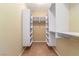 Well-organized walk-in closet with multiple shelves and ample storage at 1172 Via Della Costrella, Henderson, NV 89011