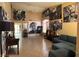 Large living room with high ceilings, hardwood floors, and large artwork at 1754 Green Apple Way, Las Vegas, NV 89142