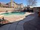 Inviting kidney shaped pool with a large patio and gazebo at 1754 Green Apple Way, Las Vegas, NV 89142