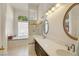 Spa-like bathroom with soaking tub, shower, and double vanity at 1812 Dalton Dr, Henderson, NV 89014