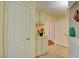 Clean hallway with tile floors and built-in storage at 1830 N Buffalo Dr # 1007, Las Vegas, NV 89128